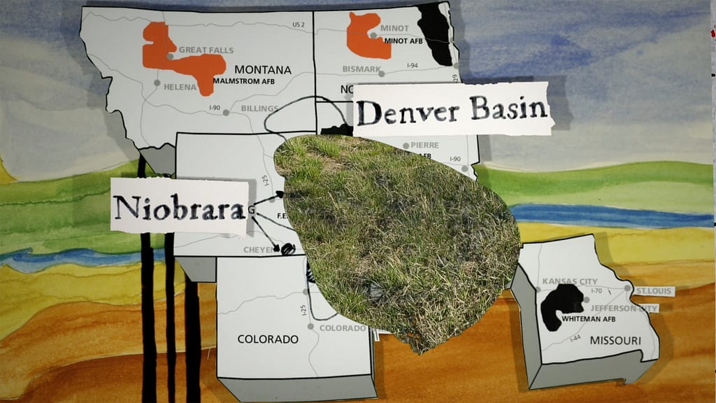 Collaged video still showing a cut-out map of plains states over watercolor background. Sections of the map are labeled in obscured, hand-written text; although one legible label reads "Denver Basin." An organic shape filled with grass spreads on the screen.
