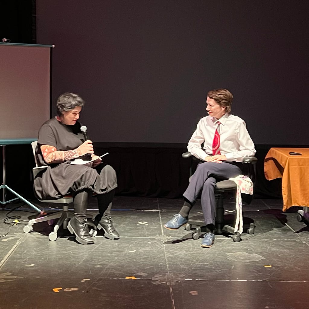 The artist Sarah Kanouse sits on the right in conversation with the artist and architect Rania Ghosn at MIT. Photograph by Azra Aksamija.