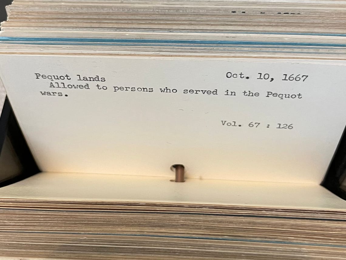 A card in a card catalog reads "Pequot Lands allowed to person who served in the Pequot War 1667"