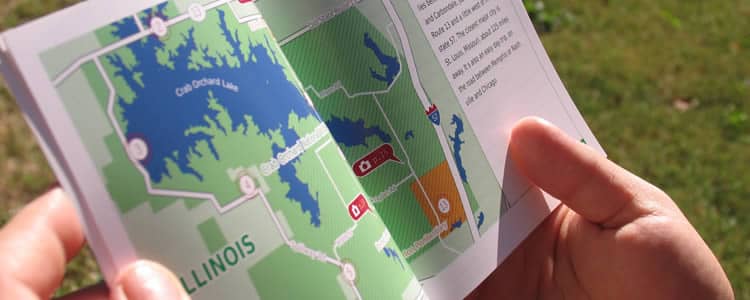Companion booklet to Stories in Reserve, opened to the America Ponds orientation map. 